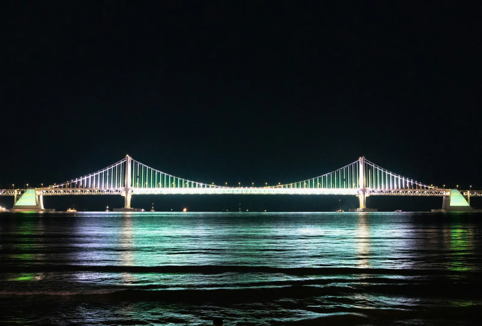 Gwangan Bridge at night, seen from Gwangalli Beach. On festival night the fireworks are fired from this bridge.