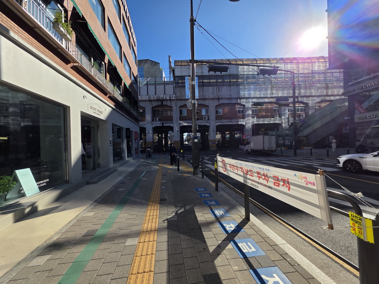 Seongsui-ro. Afternoon light under the overpass.
